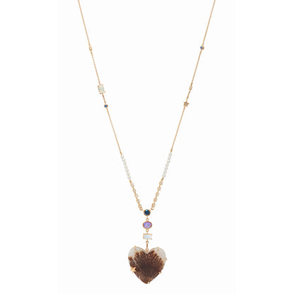 From the whimsical Fairydusted Collection, the Titania Heart Necklace embodies a playful elegance and a curated sense of charm. Featuring a heart-shaped agate at its center, the necklace is adorned with a magical scattering of moonstones (.62 cts), opals (17 cts), iolite (.23 cts), sapphires, pearls, and a sparkling diamond (.11 cts). Set on an adjustable 18k gold chain, it can be worn at lengths from 17" to 21".