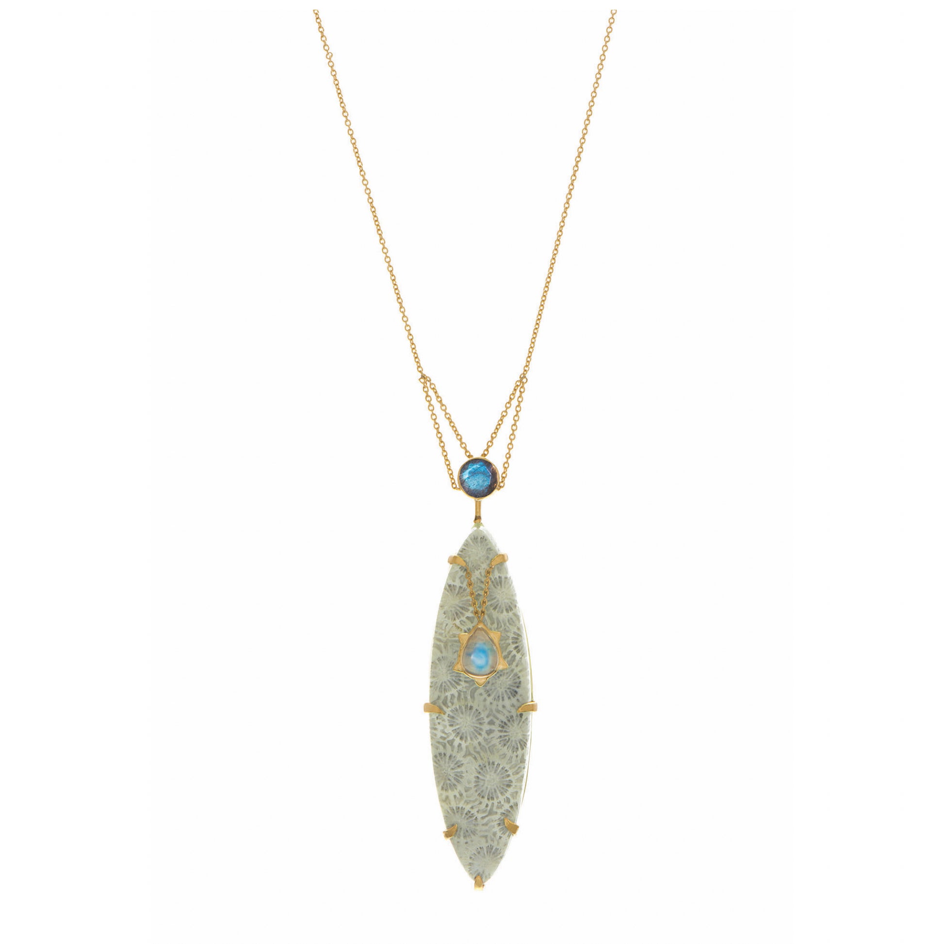 Ba Li Dynasty Necklace by Unhada - A harmonious blend of nature and history, this necklace showcases a marquise-cut fossilized coral centerpiece, framed by faceted labradorite and a luminous moonstone. Crafted in 18k gold, the pendant’s details evoke ancient elegance. Pendant measures 2.3" x 0.6" on a 26" chain.