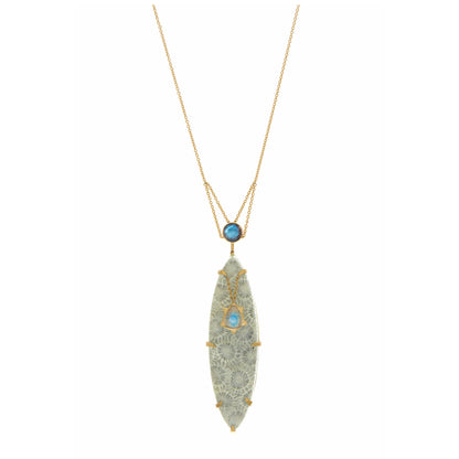 Ba Li Dynasty Necklace by Unhada - A harmonious blend of nature and history, this necklace showcases a marquise-cut fossilized coral centerpiece, framed by faceted labradorite and a luminous moonstone. Crafted in 18k gold, the pendant’s details evoke ancient elegance. Pendant measures 2.3" x 0.6" on a 26" chain.