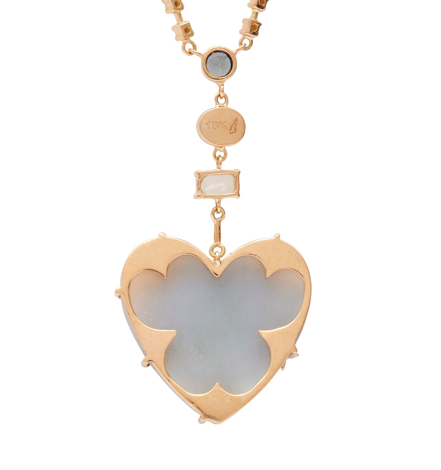 From the whimsical Fairydusted Collection, the Titania Heart Necklace embodies a playful elegance and a curated sense of charm. Featuring a heart-shaped agate at its center, the necklace is adorned with a magical scattering of moonstones (.62 cts), opals (17 cts), iolite (.23 cts), sapphires, pearls, and a sparkling diamond (.11 cts). Set on an adjustable 18k gold chain, it can be worn at lengths from 17" to 21".