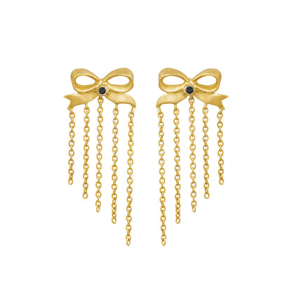 ☆ Best Seller ☆ Ingenue Bow Studs by Unhada -&nbsp;Charming and timeless, the Ingenue Bow Studs are handcrafted in 18k gold with delicate diamond accents (.05 cts). Designed with a post back for effortless wear, these versatile earrings bring a touch of refinement to your everyday style. Also available in sapphire, ruby, or tsavorite garnet—please contact us to inquire about alternate gemstone options.