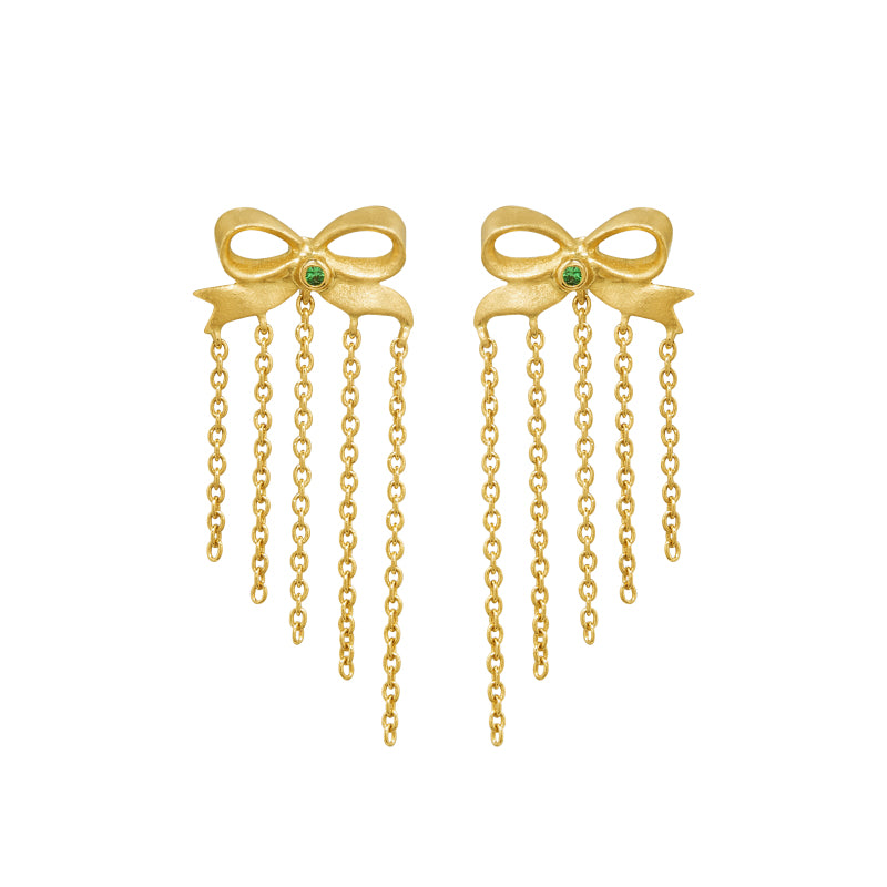 ☆ Best Seller ☆ Ingenue Bow Studs by Unhada -&nbsp;Charming and timeless, the Ingenue Bow Studs are handcrafted in 18k gold with delicate diamond accents (.05 cts). Designed with a post back for effortless wear, these versatile earrings bring a touch of refinement to your everyday style. Also available in sapphire, ruby, or tsavorite garnet—please contact us to inquire about alternate gemstone options.